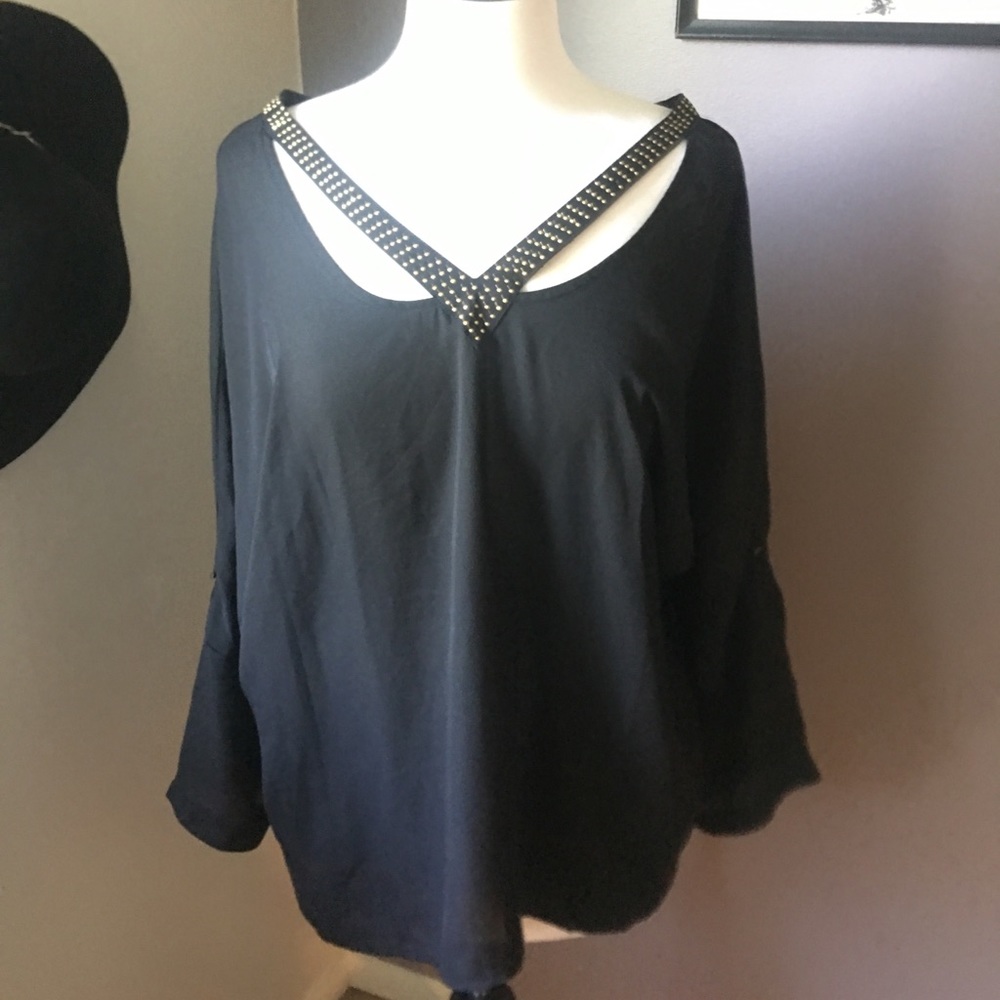 Black top with gold stud detail